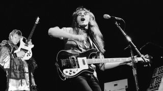 Geddy Lee from Canadian rock group Rush performs live on stage at Bingley Hall in Staffordshire, England on 21st September 1979