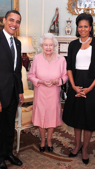 The late Queen with President Barack Obama and Michelle Obama