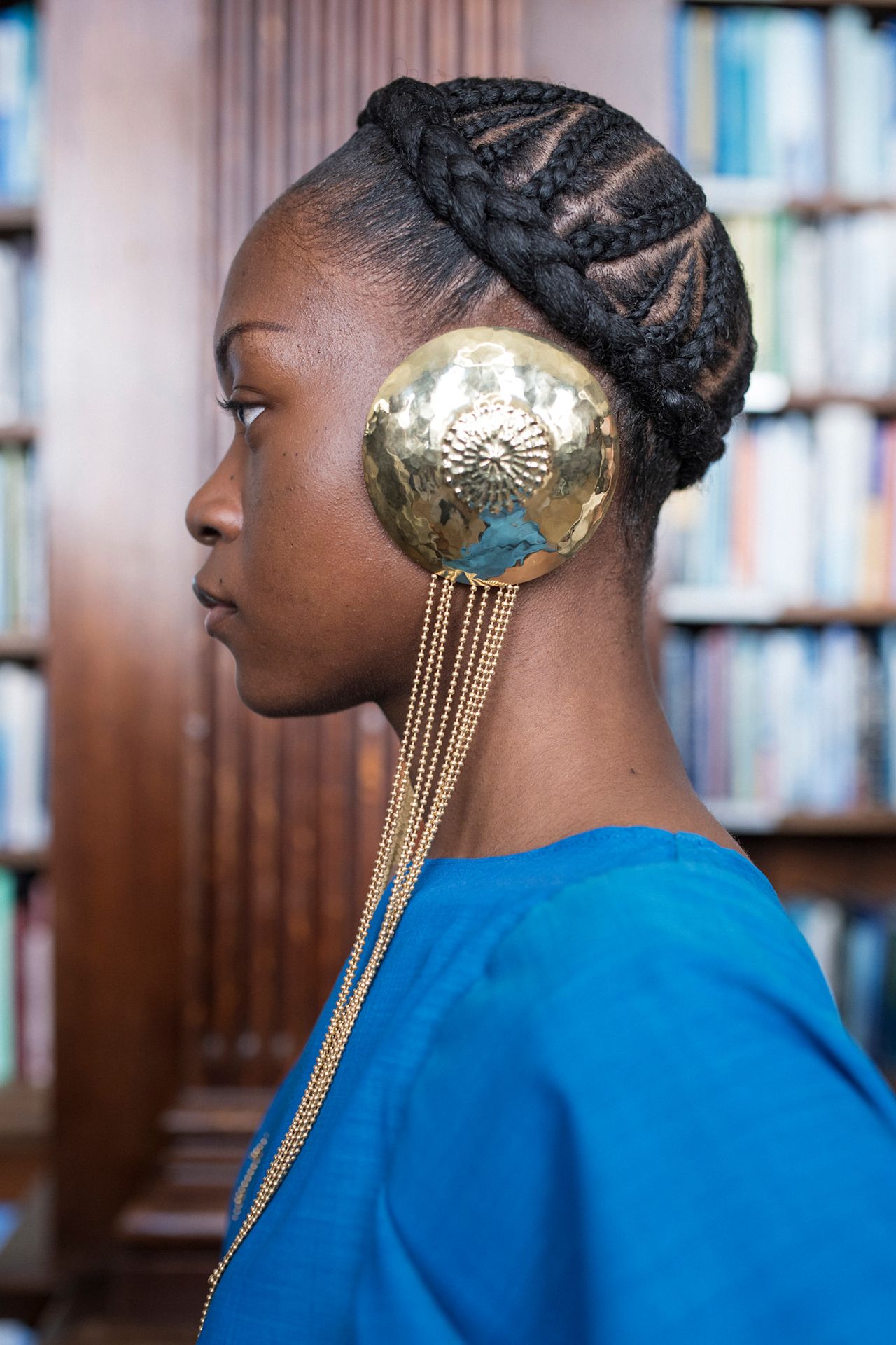 Various women with cornrow-braided hairstyles.