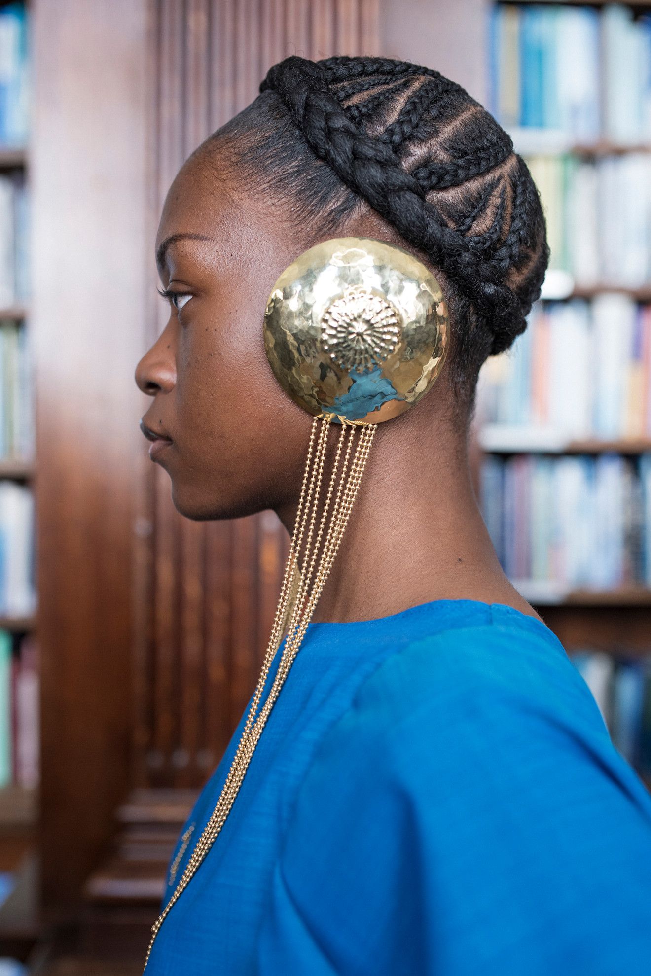 Various women with cornrow-braided hairstyles.