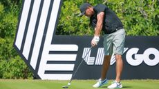 Brooks Koepka hits a tee shot during a LIV Golf event
