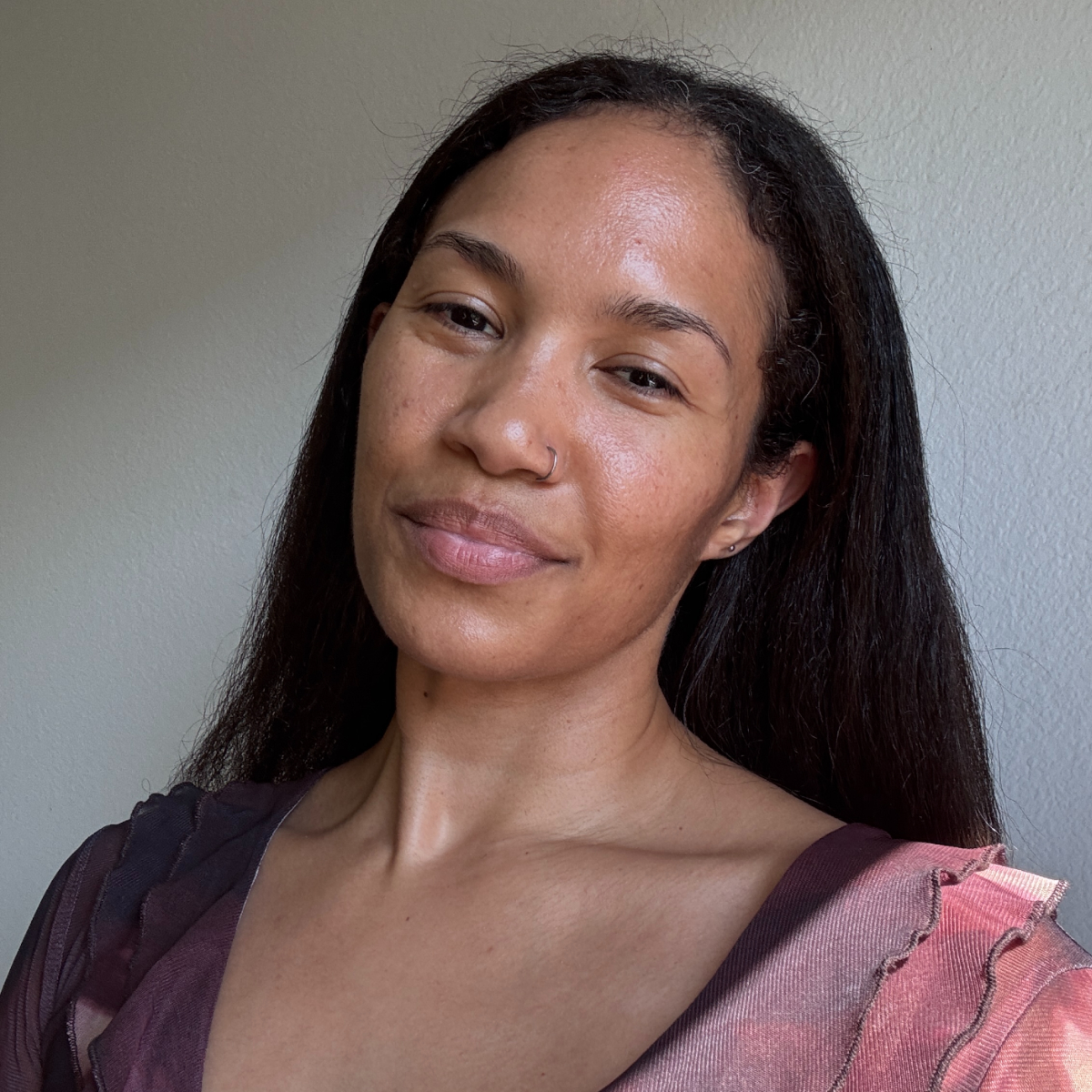 A beauty editor with straight hair after testing Shark Beauty's SilkiPro Straightener