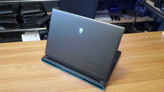 black gaming laptop facing back
