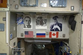 Flags of Expedition 34 on the International Space Station