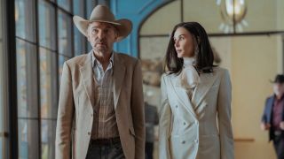 From left to right: Billy Bob Thornton as Tommy Norris and Demi Moore as Cami walking down a hallway. Cami is looking to her left. 