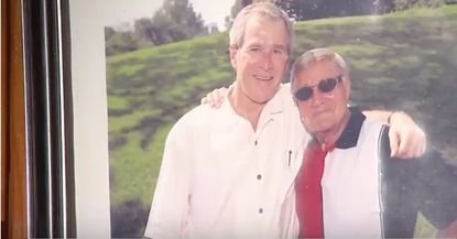 Charlie Brotman with George W. Bush.