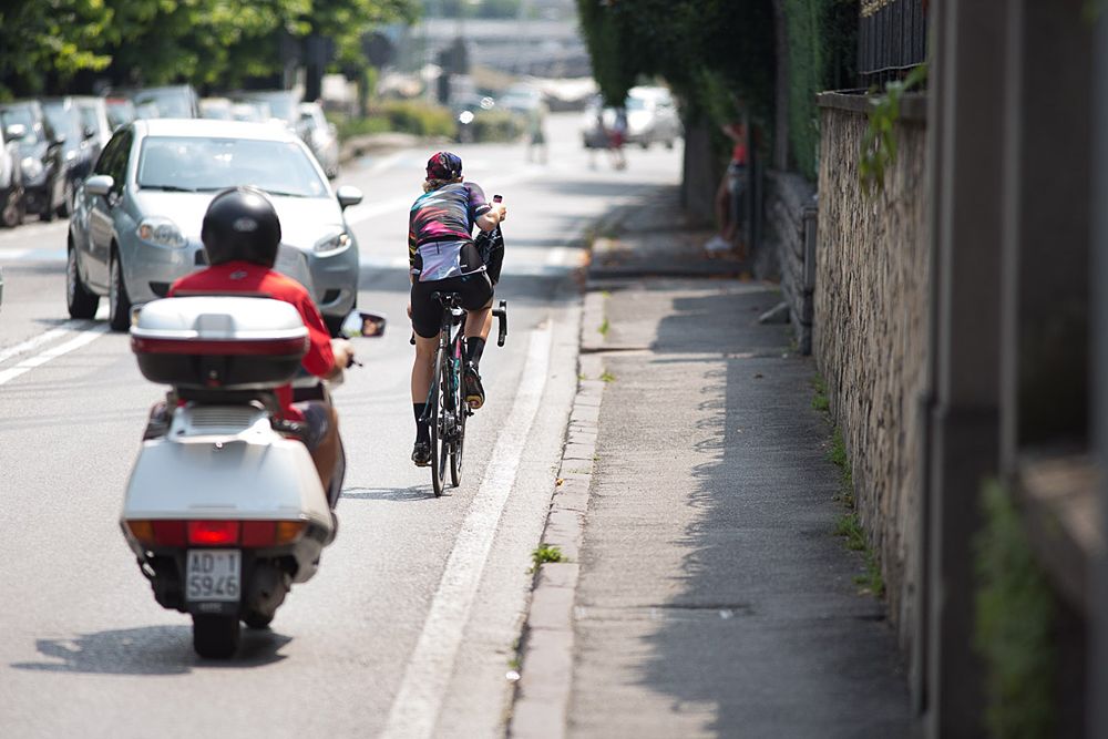 Stage winner Tiffany Cromwell (AUS) of CANYON//SRAM Racing rides back to the team bus after the Giro Rosa 2016 - Stage 4