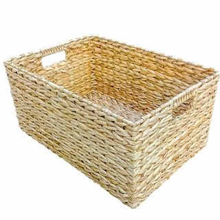 pale wicker storage basket with handles