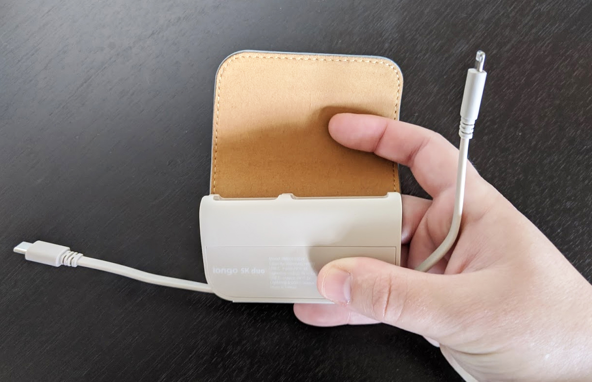 Moshi Iongo 5k Duo with both lightning cable and USB-C cables pulled out