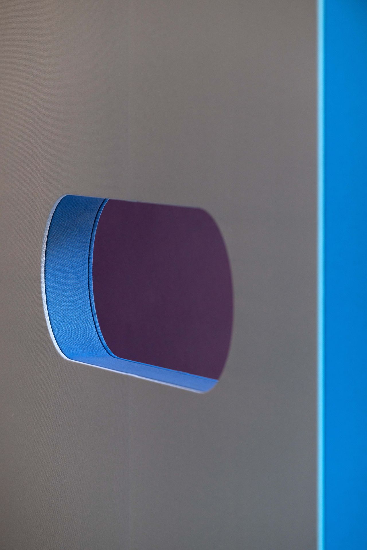 Abstract shapes and shadows made using colourful textiles and glass
