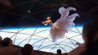 Artist's rendering of a violinist performing in weightlessness on board SpaceX's BFS while on a journey the moon.