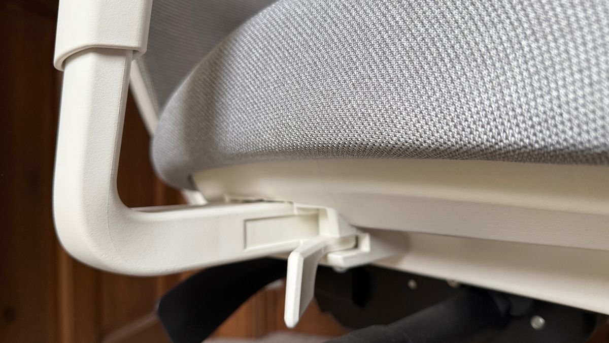 Shots of the Ergonomic Chair Pro, by Brach, in a hallway.