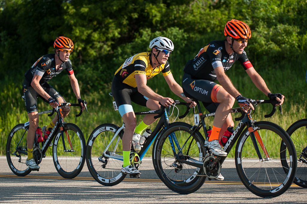 In the break Ben Hill (Donkey Label Racing) follows the wheel of Ryan Anderson (Optum p/b Kelly Benefit Strategies) with William Routley (Optum p/b Kelly Benefit Strategies)supporting his teammate