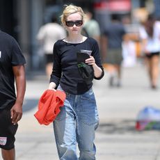 Julia Garner barrel jeans