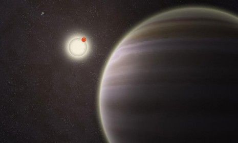 An artist&amp;#039;s rendition of the newly discovered planet named PH1, seen in the foreground. The planet is 3,200 light-years away from Earth.