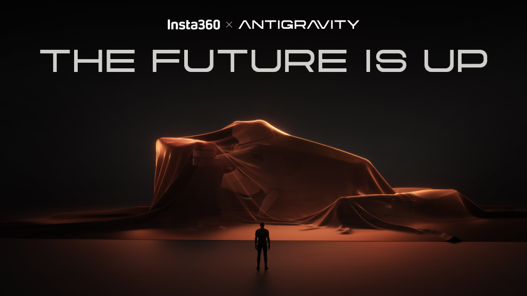 Silhouette of person looking at giant drone with blanket over it and caption 'the future is up'