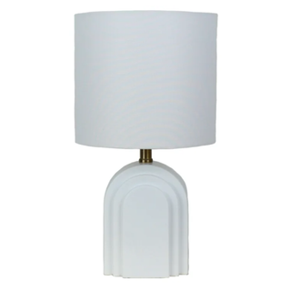 white table lamp with artistic arched base