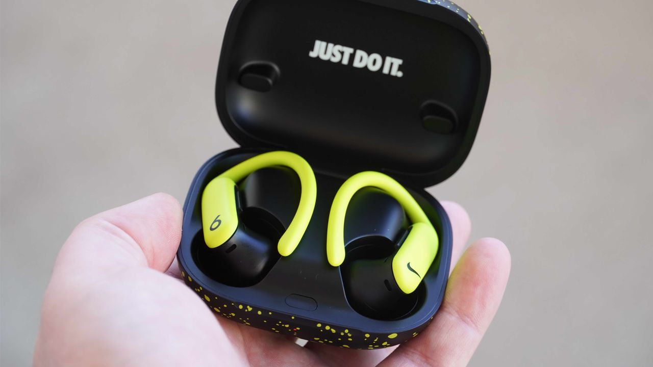The Nike Special Edition variant of the Powerbeats Pro 2 in a volt and matte black colorway.