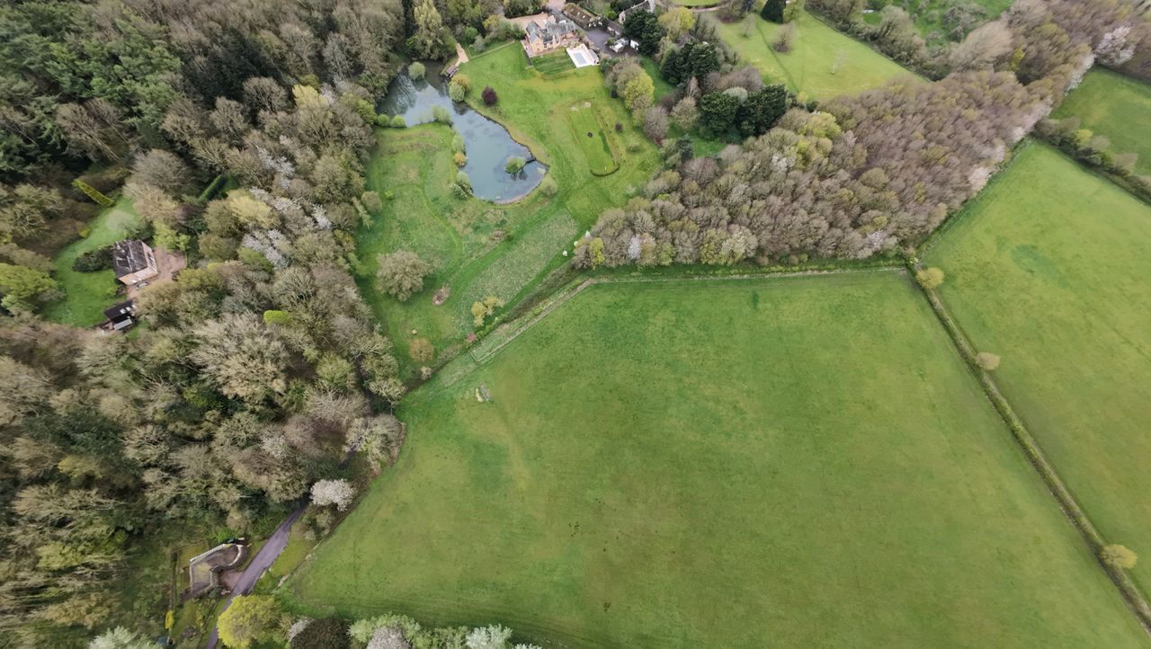 Aerial images of rural UK village and fields on an overcast day taken with the DJI Avata 2