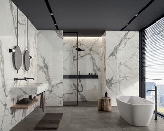 White marble bathroom including shower cubicle