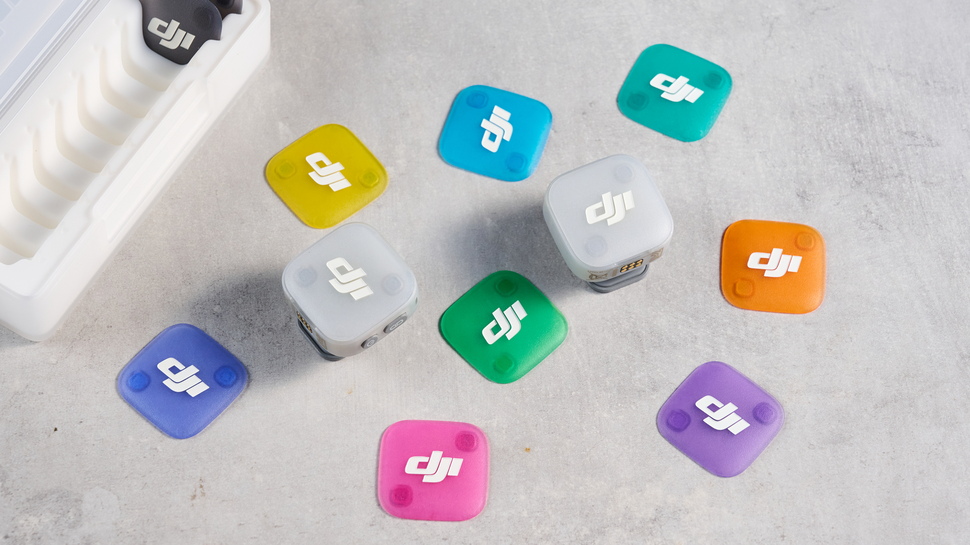 the dji mic mini 2 for camera and smartphone conent creators photographed against the blue tom's guide background