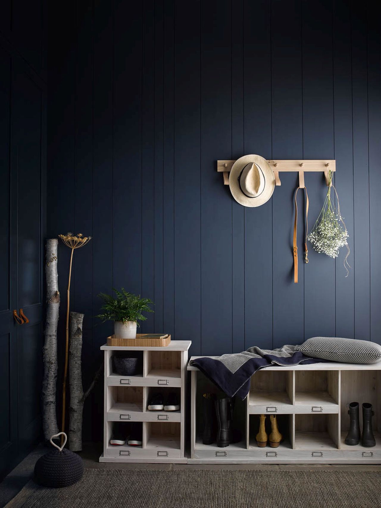 blue mudroom/bootroom/hallway storage with storage units and peg rail 