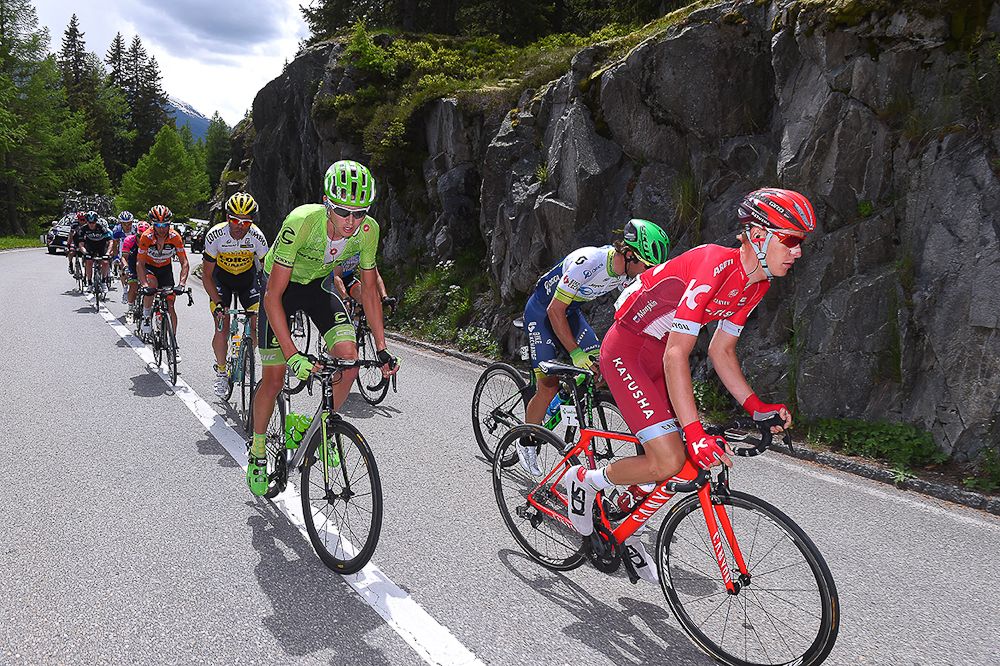 Matvey Mamykin and Joe Dombrowski climb during stage 5 at the Tour de Suisse