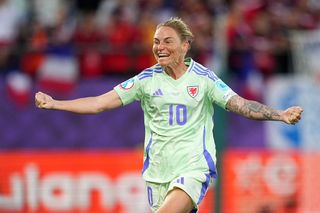 Jess Fishlock of Wales celebrates scoring her team's first goal after the VAR reviewed the on-field decision to disallow the goal before overturning and awarding the goal during the UEFA Womens EURO 2025 Group D match between France and Wales at Arena St. Gallen on July 09, 2025 in St Gallen, Switzerland.