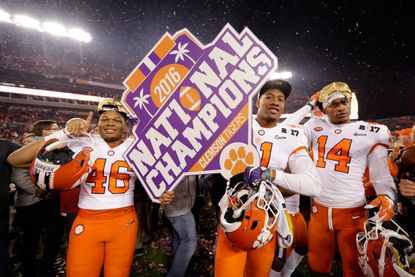 The Clemson Tigers celebrate their victory 