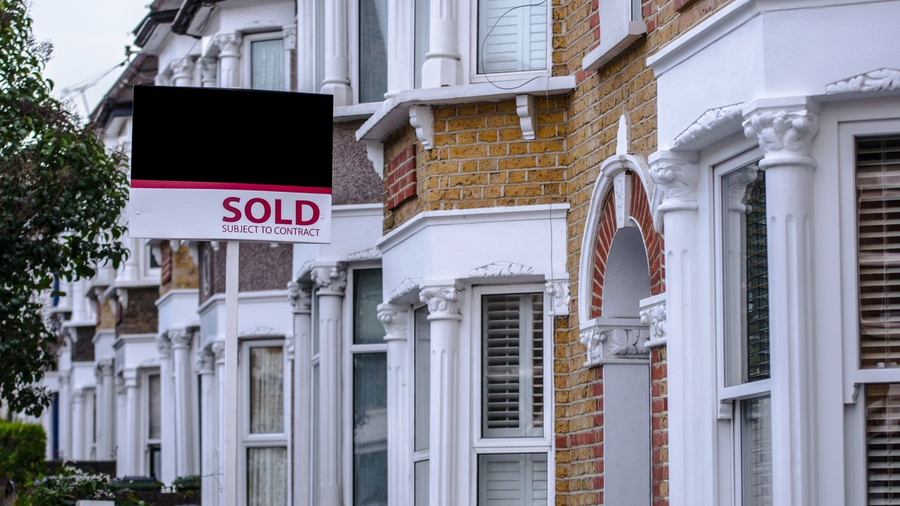 Houses with a sold sign