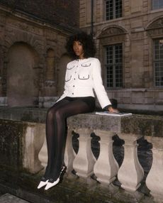 Emmanuelle Kofi wears a two-piece