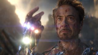 Robert Downey Jr.'s Tony Stark snapping the Infinity Gauntlet during the events of Avengers: Endgame.