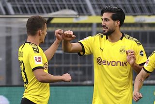 Dortmund players celebrate a goal against Hertha Berlin