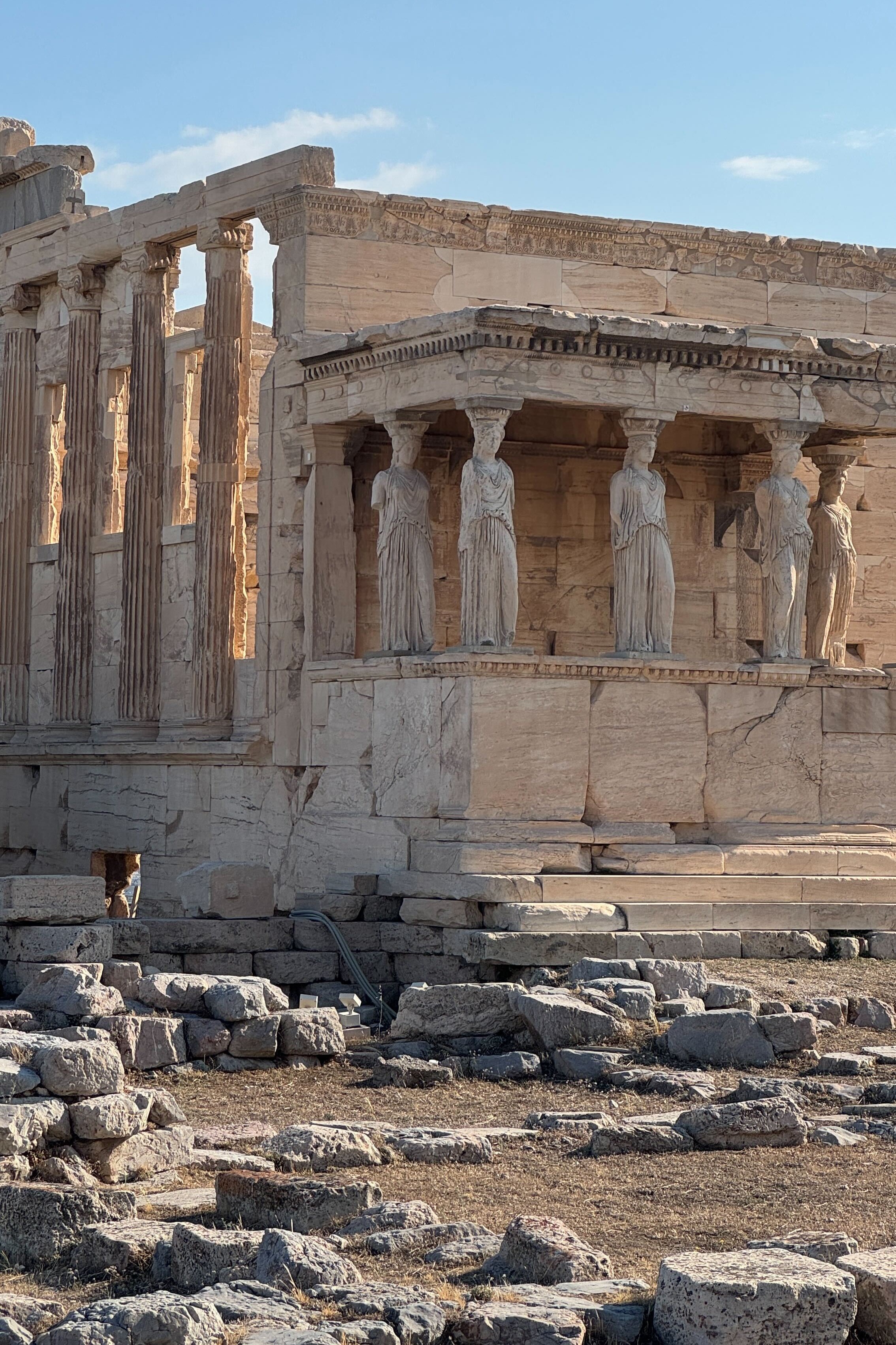 A serious of sights, restaurants, plates, and newsstands in Athens merge rough cement buildings with a contemporary vibe.