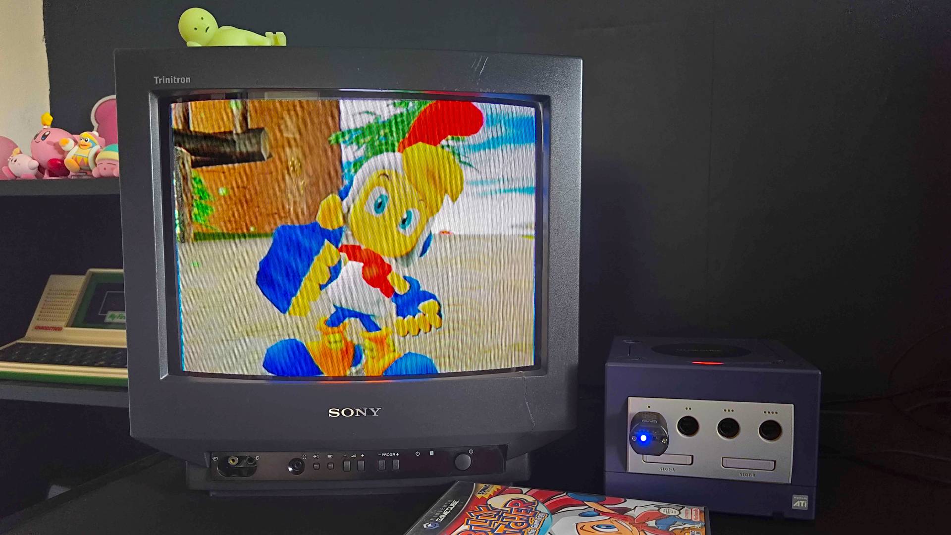 Nintendo GameCube plugged into Sony Trinitron CRT TV with Billy Hatcher and the Giant Egg gameplay on screen.
