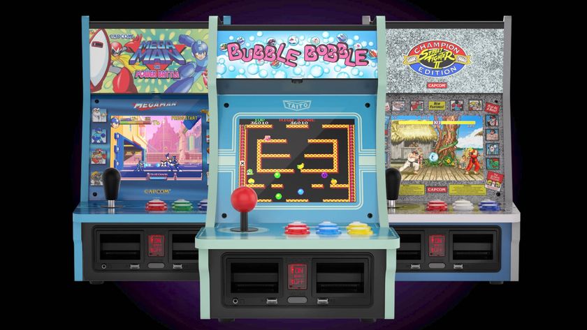 Evercade Alpha Taito Edition with Mega Man version behind on left and Street Fighter 2 version on right with black backdrop.