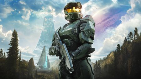 Key art from Halo Campaign Evolved featuring Master Chief holding the iconic assault rifle. The outer rim of the planet Halo floats in the background.
