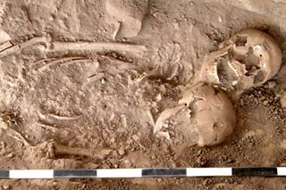 A man and woman were buried together in this "spooning" position more than 1,000 years ago in Israel. Archaeologists call the couple "Romeo and Juliet." 