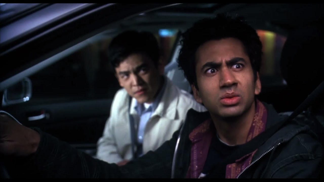 John Cho and Kal Penn in a car in Harold and Kumar Go to White Castle