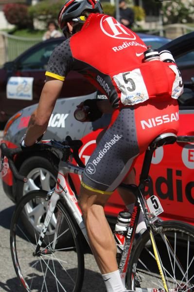 Jason McCartney (RadioShack) grabs a can of coke for the road.