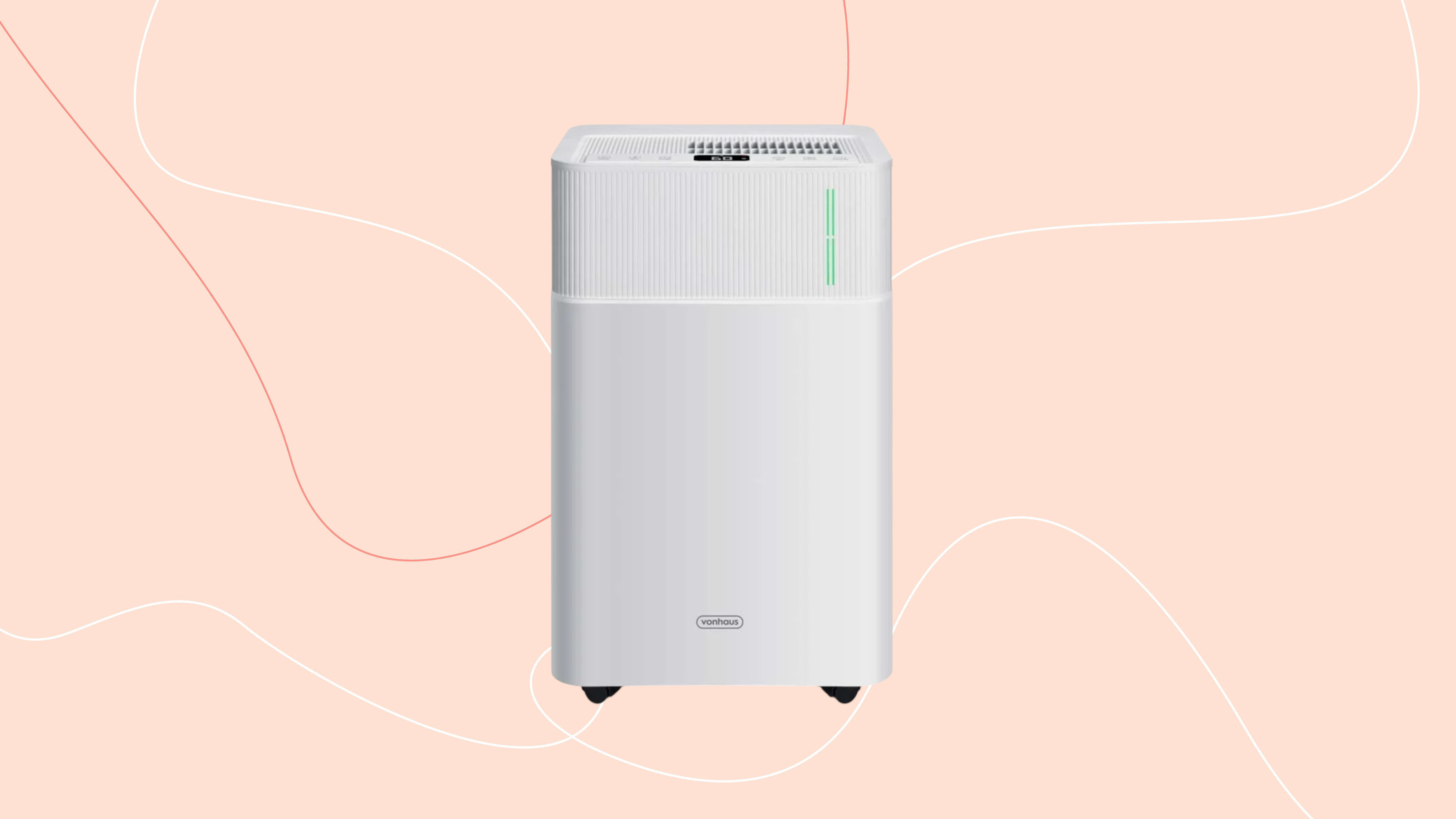 Vonhaus portable 20L dehumidifier on a pink graphic background