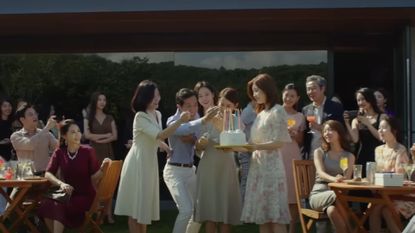 A group of guests at a birthday party during Parasite, one of the best movies on HBO Max. 