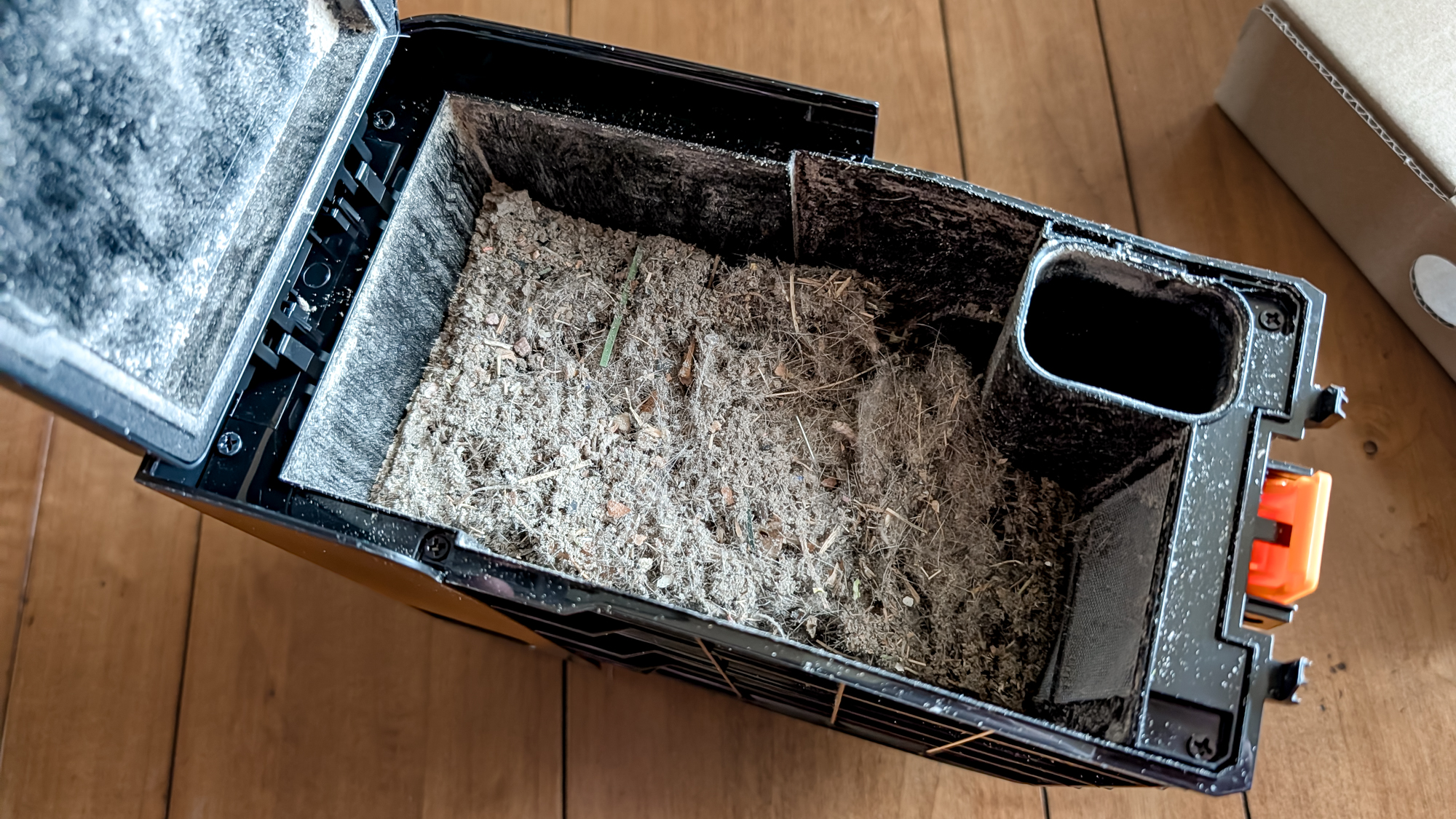 Storage bin of a Shark UV Reveal PowerDetect Robot Vacuum