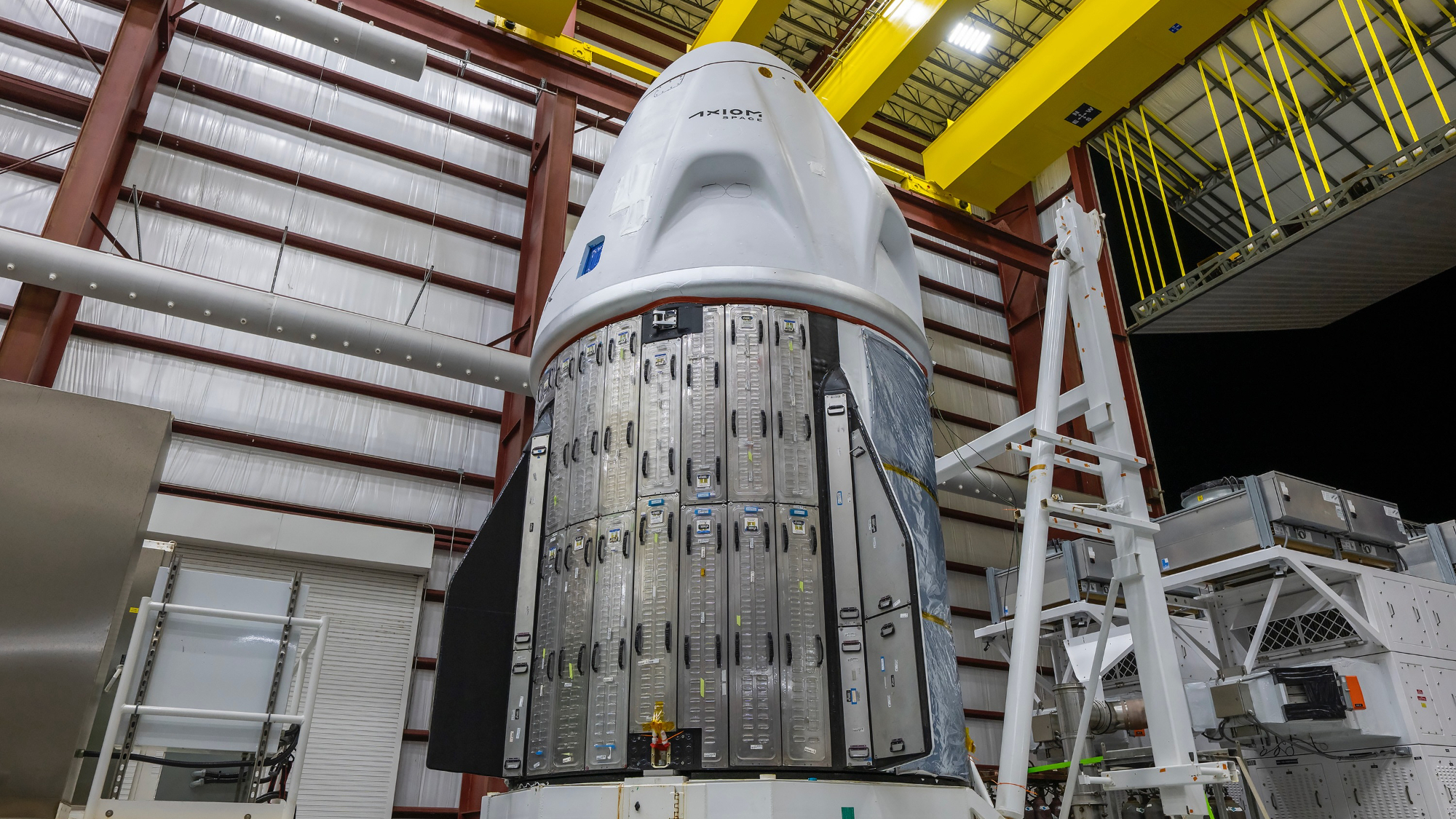 The brand-new SpaceX Crew Dragon capsule that will fly the private Ax-4 astronaut mission to the ISS is seen inside the hangar at Launch Pad 39A at NASA’s Kennedy Space Center in Florida.