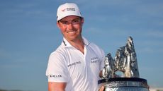 Ben Griffin with the World Wide Technology Championship trophy 
