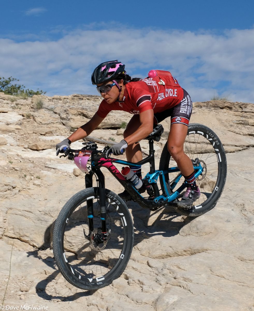 Evenly Dong (Full Cycle) descending some steep slickrock