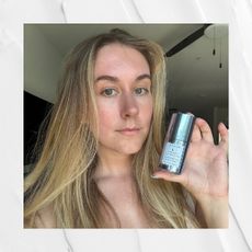 Beauty editor Kaitlyn McLintock holding Naturium's Mult-Active Exosome Serum