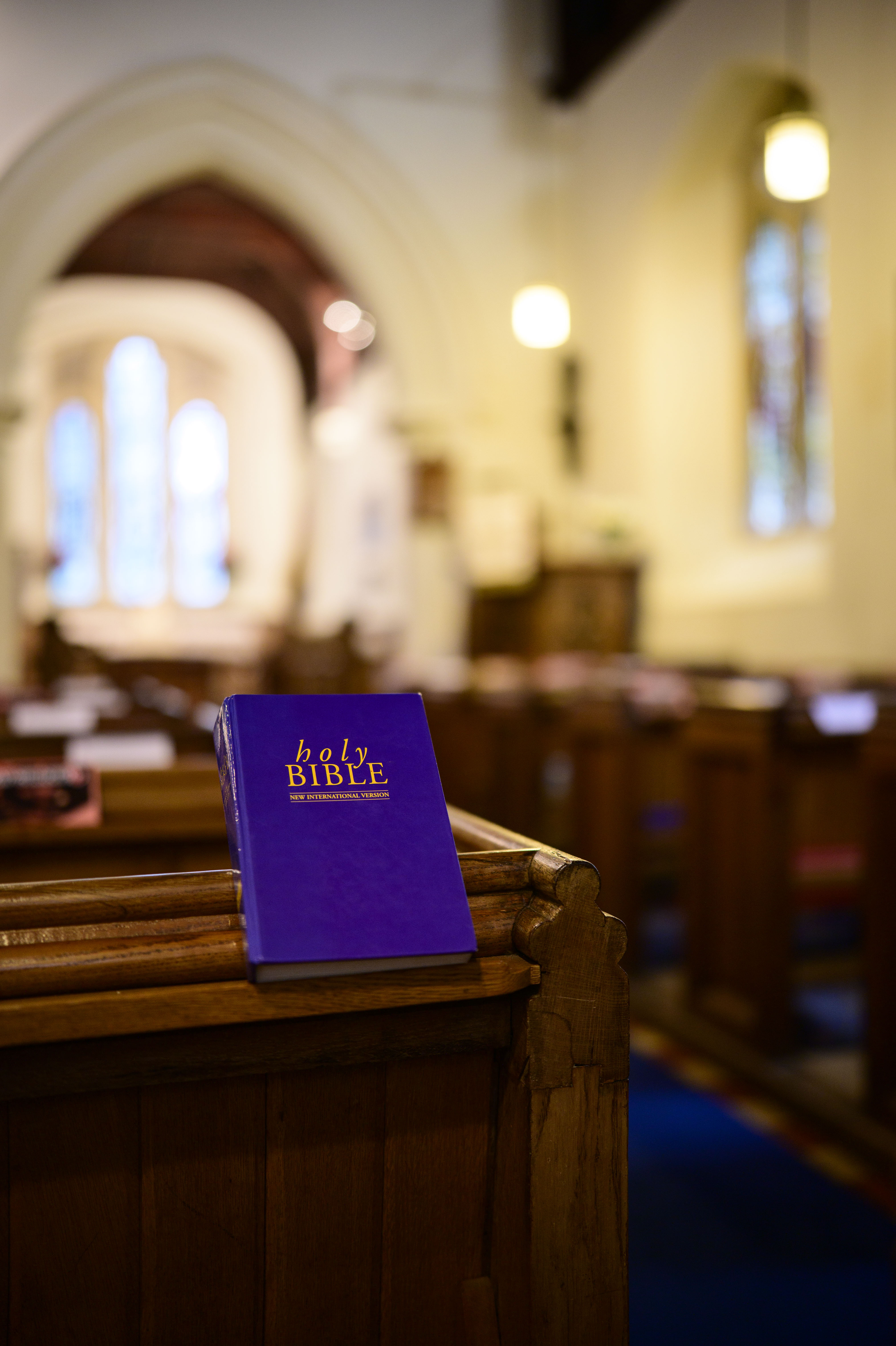Viltrox AF 35mm F1.2 LAB lens sample gallery: a bible sits on a pew in an old church