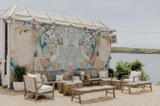 The Surf Lodge Montauk hotel beach seating with mural