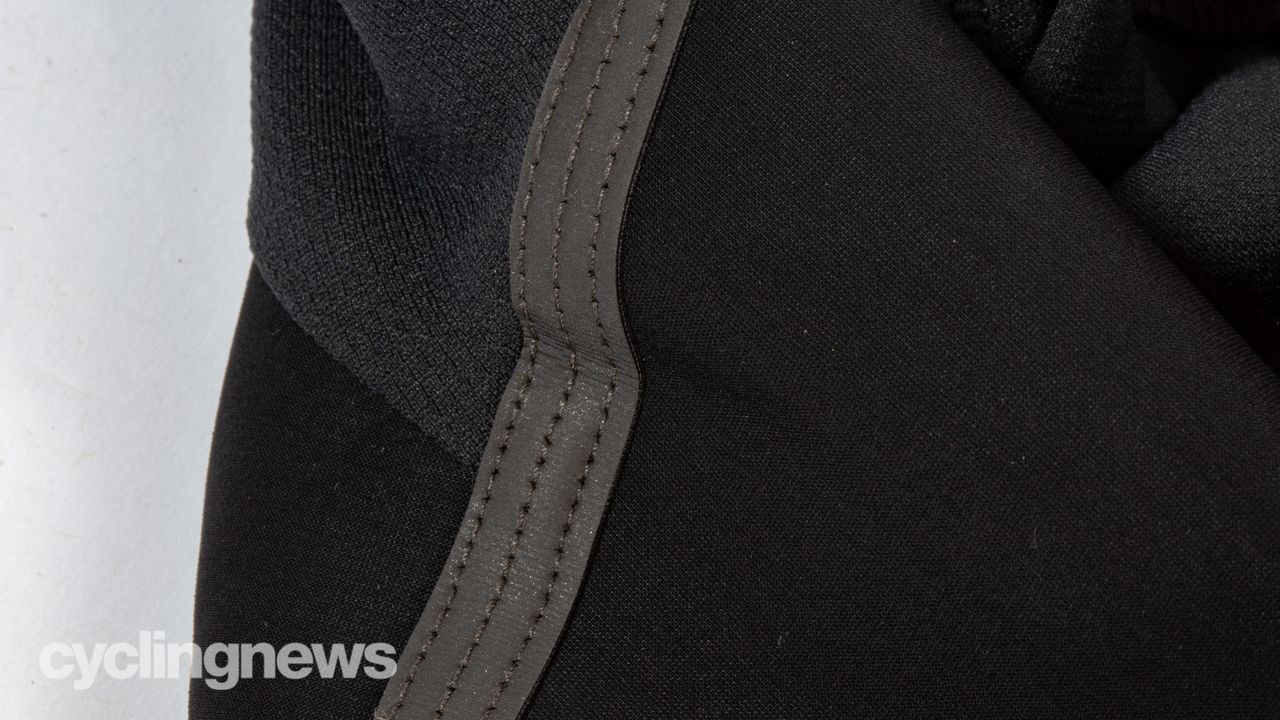 Assos Equipe RS Spring Fall Gilet detail of reflective strip on shoulders